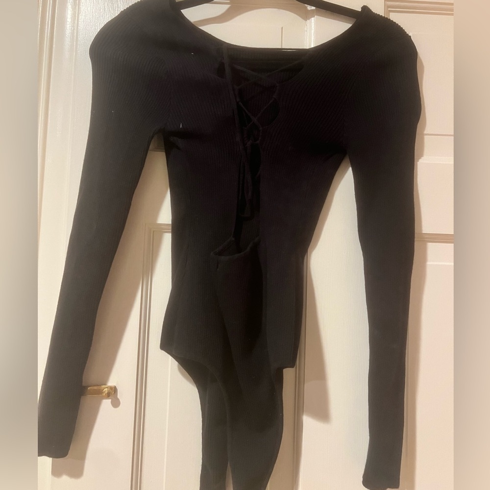 Black knit long-sleeve body suit. Perfect fit! Size medium.